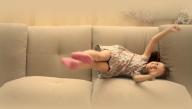 Little girl dancing on the couch